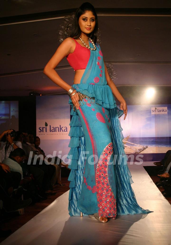 A Sri Lankan model presenting creation by Sri Lankan designer Darshi Keertisena during the Sri Lankan fashion show in New Delhi on 15 Sept Tuesday night 2009