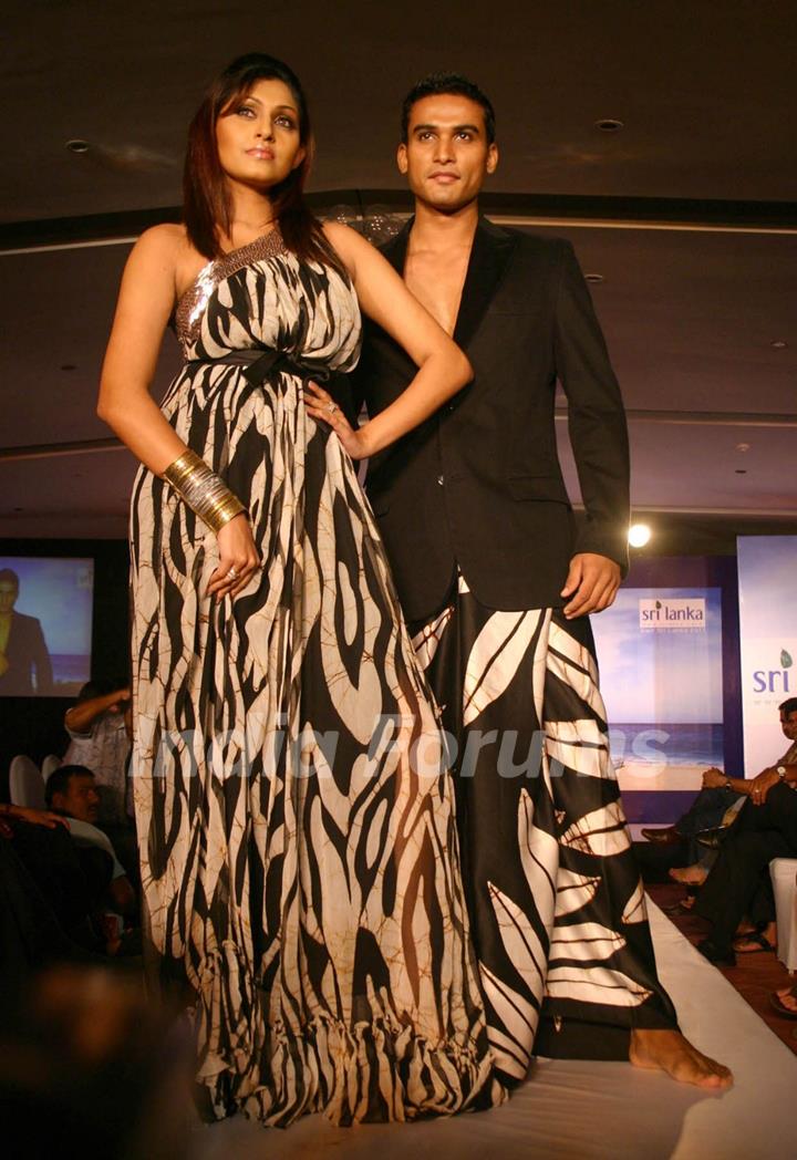 A Sri Lankan model presenting creation by Sri Lankan designer Darshi Keertisena during the Sri Lankan fashion show in New Delhi on 15 Sept Tuesday night 2009