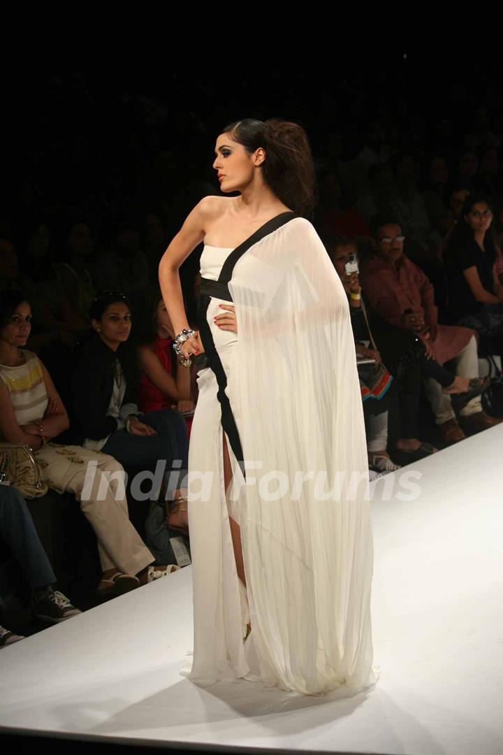 A model walks the runway at the Swapnil Shinde show at Lakme Fashion Week Spring/Summer 2010