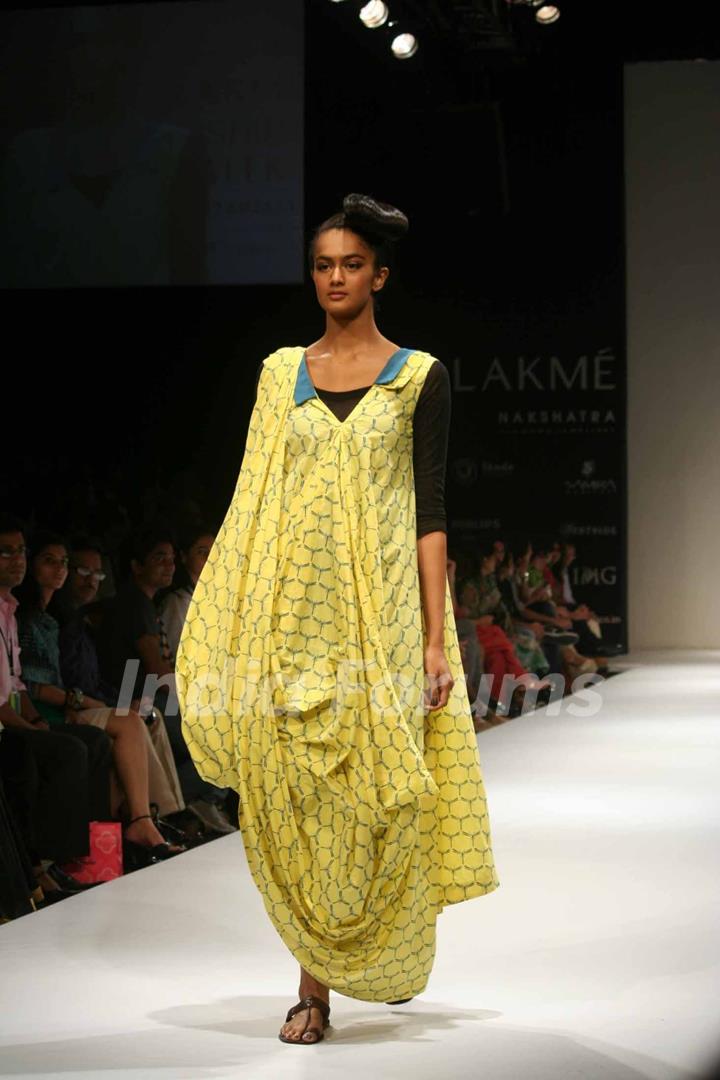 A model walks the runway at the Kallol Datta show at the Lakme Fashion Week Spring/Summer 2010 Day 5, in Mumbai