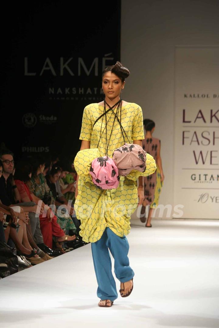 A model walks the runway at the Kallol Datta show at the Lakme Fashion Week Spring/Summer 2010 Day 5, in Mumbai