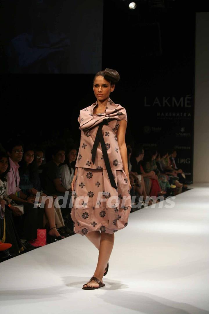 A model walks the runway at the Kallol Datta show at the Lakme Fashion Week Spring/Summer 2010 Day 5, in Mumbai