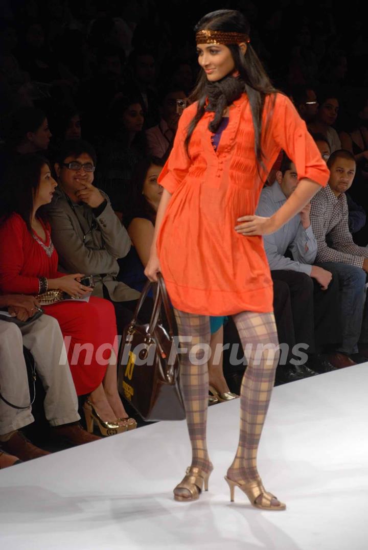 A model walks the runway at Narendra Kumar show at the Lakme Fashion Week Spring/Summer 2010 Day 5, in Mumbai