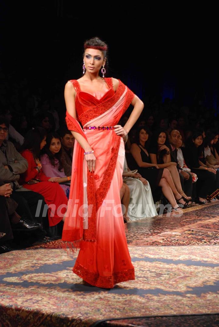 A model walks the runway at Tarun Tahiliani show at the Lakme Fashion Week Spring/Summer 2010 Day 5, in Mumbai