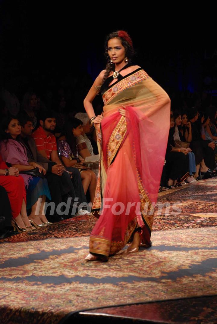 A model walks the runway at Tarun Tahiliani show at the Lakme Fashion Week Spring/Summer 2010 Day 5, in Mumbai