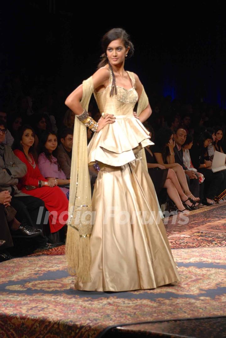 A model walks the runway at Tarun Tahiliani show at the Lakme Fashion Week Spring/Summer 2010 Day 5, in Mumbai