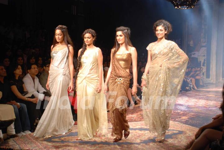 Models walks the runway at Tarun Tahiliani show at the Lakme Fashion Week Spring/Summer 2010 Day 5, in Mumbai