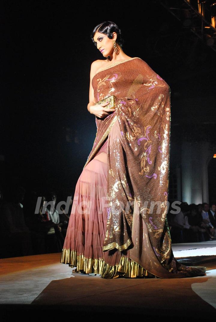 Model walk on the ramp of Suneet Erma''s fashion show at HDIL ICW at HDIL, Grand Hyatt in Mumbai on Thursday,15 October 2009