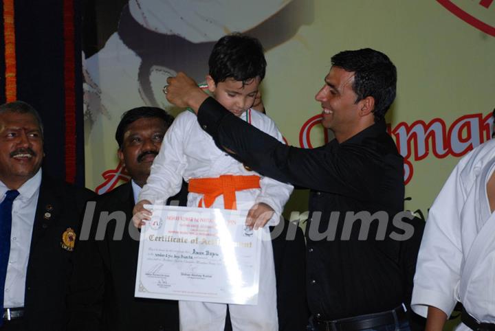 Bollywood Actor Akshay Kumar addresses during 1st Invitational Open National Karate Championship at Andheri Sports Complex, Mumbai on Wednesday, 21 October 2009