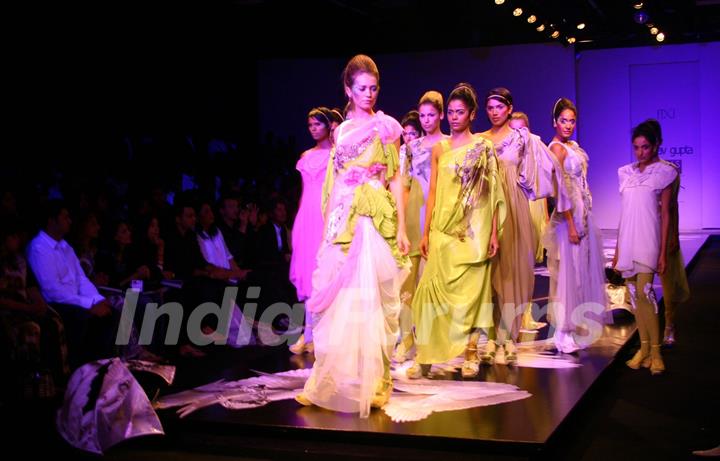 Models showcasing designer Gaurav Gupta''s creation at the Wills Lifestyle India Fashion week in New Delhi on Tuesday 27 Oct 2009