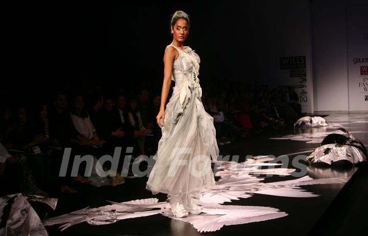 A model showcasing designer Gaurav Gupta''s creation at the Wills Lifestyle India Fashion week in New Delhi on Tuesday 27 Oct 2009