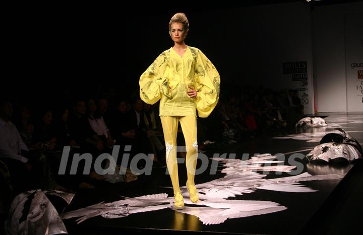 A model showcasing designer Gaurav Gupta''s creation at the Wills Lifestyle India Fashion week in New Delhi on Tuesday 27 Oct 2009