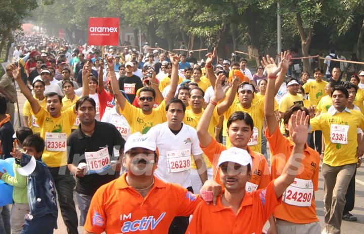 Participants at the Airtel Delhi Half Marathon,in New Delhi on Sunday ( Photo: IANS)