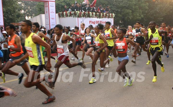 Participants at the Airtel Delhi Half Marathon, in New Delhi on Sunday ( Photo: IANS)