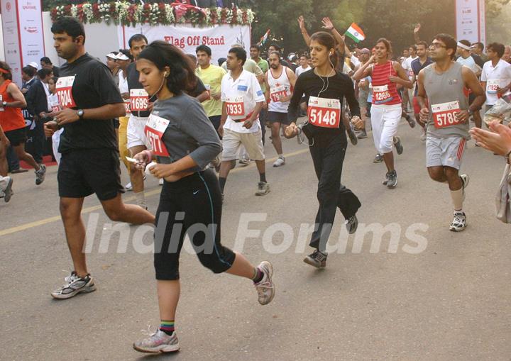 Participants at the Airtel Delhi Half Marathon, in New Delhi on Sunday ( Photo: IANS)