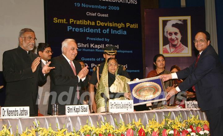 President Pratibha DeviSingh Patil receiving the mementos from Vice-Chancellor V N Rajasekharan Pilla at the Silver Jubille Celebration of Indira Gandhi National Open University in New Delhi on Thursday also in photo HRD ministers Kapil Sibal