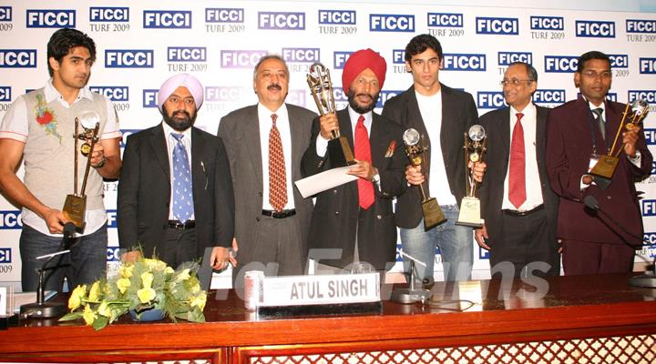 FICCI Sec Gen Dr Amit Mitra and Atul Singh with the awardees Vijender Singh, Milkha Singh, Virdhawal Khade and Prasant Karmarkar in New Delhi on Wednesday 16 Dec 2009