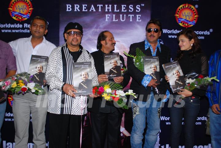 Jazz Musician Louis Banks, Pandit Ronu Majumdar, Jackie Shroff and Yuvika Chaudhary pose for the photographers during their album launch of &quot;Breathless Flute&quot; in Mumbai