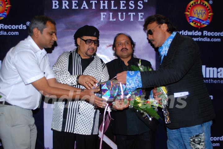 Jazz Musician Louis Banks, Pandit Ronu Majumdar and Jackie Shroff pose for the photographers during their album launch of &quot;Breathless Flute&quot; in Mumbai