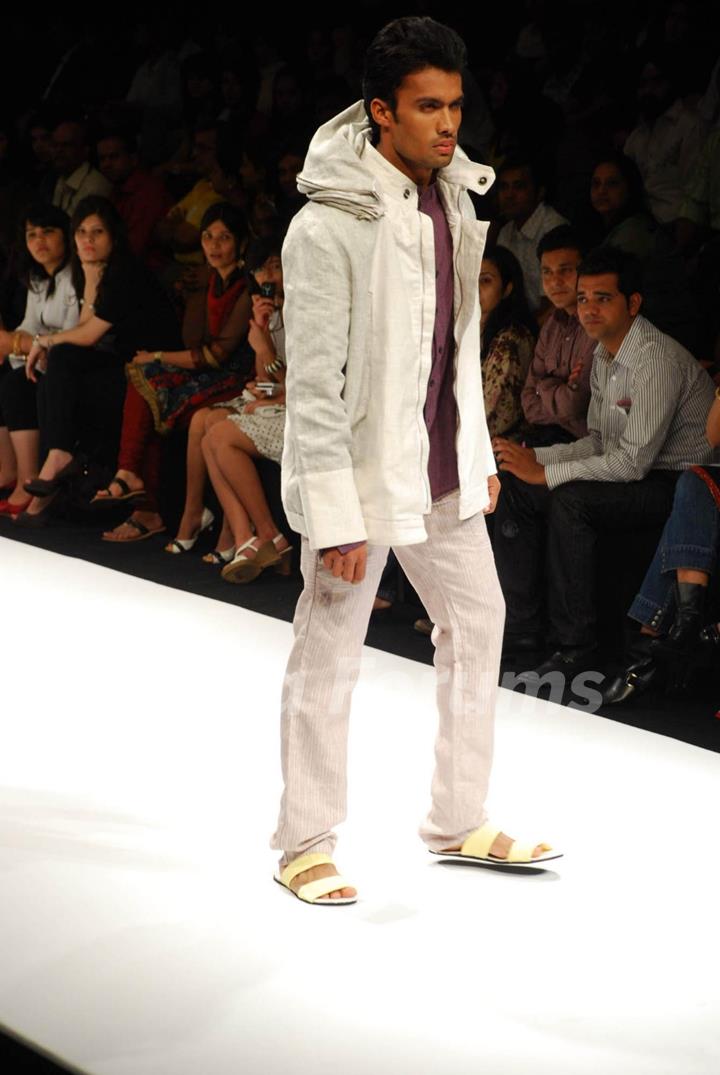 Model walks on the ramp for designer Amalaraj Sengupta at Lakme Fashion Week 2010