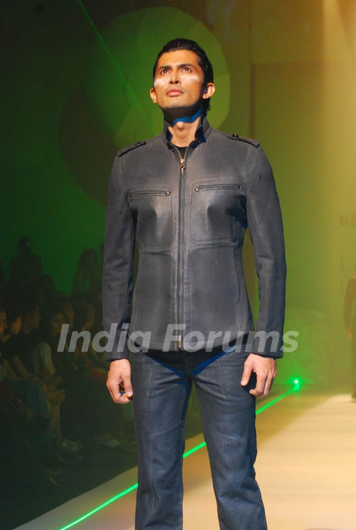 Model walks on the ramp for designer Narendra Kumar Ahmed at Lakme Fashion Week 2010