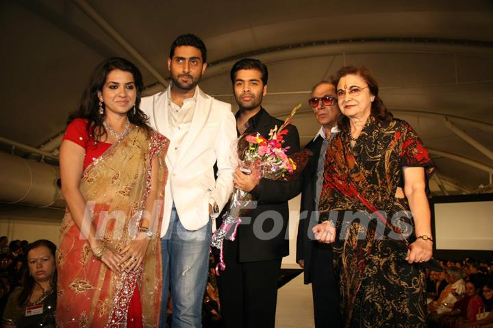 Abhishek, Karan Johar and Y K Sapru with wife at CPAA Shaina NC show presented by Pidilite at Lalit Hotel