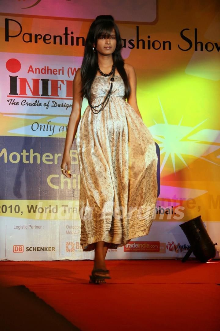 Pregnant women strike pose during Maternity and Parenting Fashion Show in Mumbai on Sunday,14 March 2010