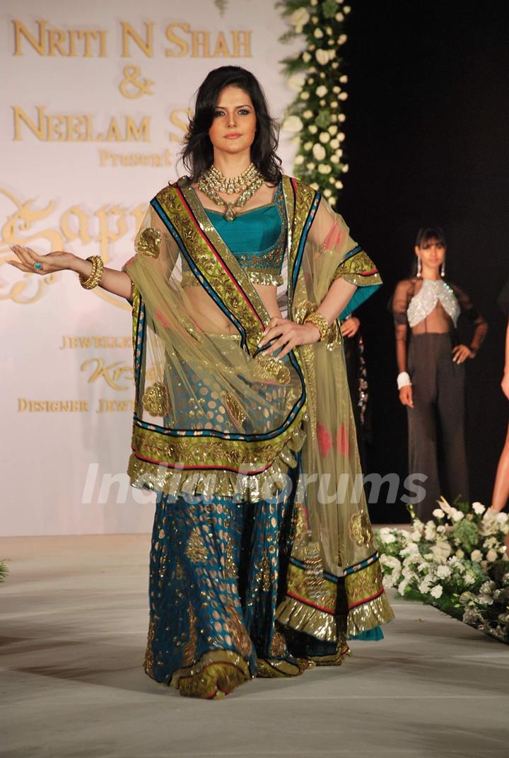 Zarine Khan walks the ramp for designers Nirati and Neelam Shah