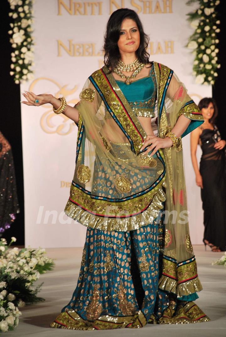 Zarine Khan walks the ramp for designers Nirati and Neelam Shah