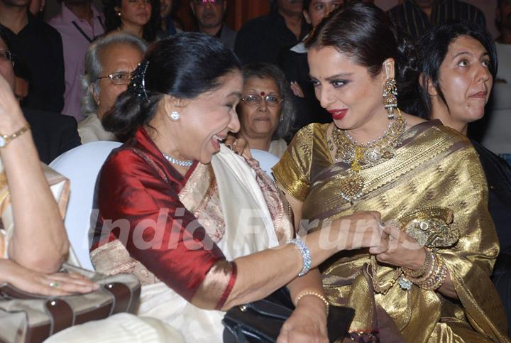 Asha Bhosle and Rekha at the launch of Gautam Rajadhyaksha''s book ''Chehere'' launch at JW Marriott