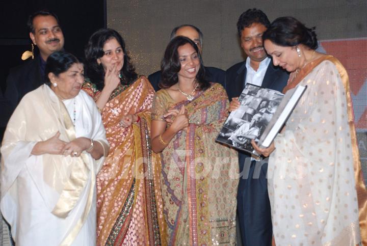 Lata Mangeshkar and Hema Malini at the launch of Gautam Rajadhyaksha''s book ''Chehere'' launch at JW Marriott