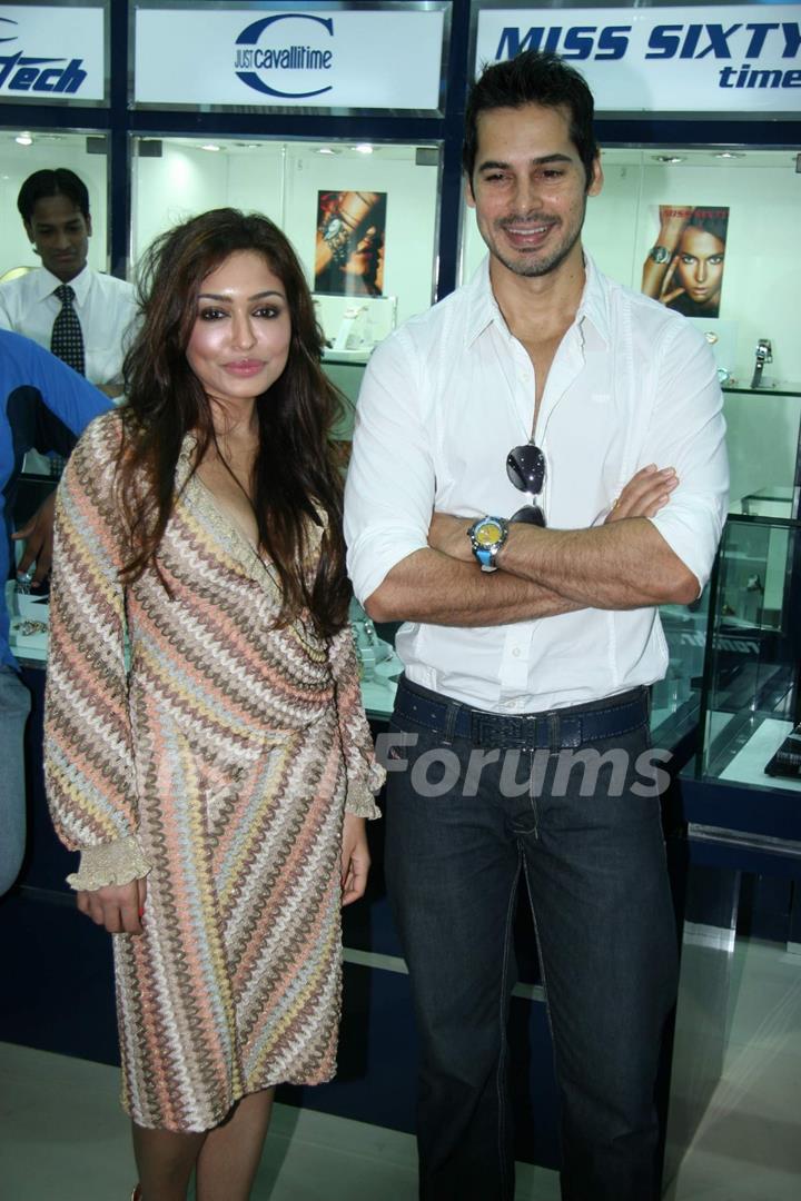 Bollywood Actors Tarina Patel and Dino Morea pose for the photographers during the inauguration of Bezel, a multi-brand lifestyle watch store from Gitanjali Lifestyle at Atria Mall, Worli in Mumbai on Wednesday, 23 June 2010 Gitanjali appoints