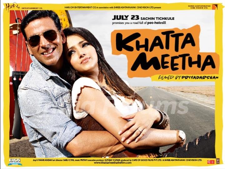 Khatta Meetha(2010) movie poster with Akshay and Trisha