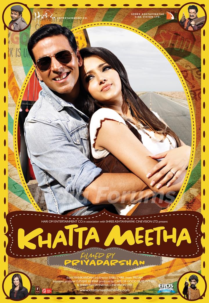 Khatta Meetha(2010) movie poster with Akshay and Trisha