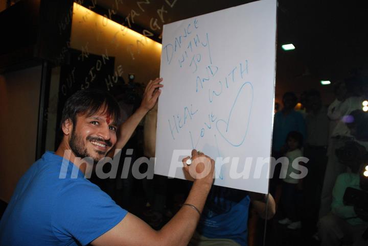 Vivek Oberoi poses for the photographers during a meet with Autistic Children