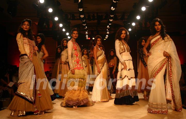 Models showcasing designer Manish Malhotra''s creations at the Delhi Counter Week 2010, in New Delhi on Tuesday