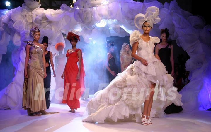 Models showcasing designer Gaurav Gupta''s creations at the Delhi Couture Week 2010, in New Delhi on Wednesday