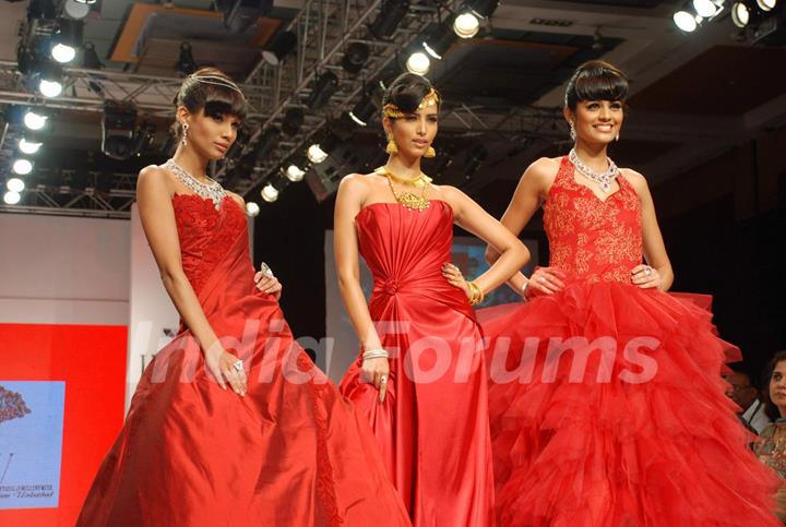 Models walk on the ramp at India International Jewellery Week