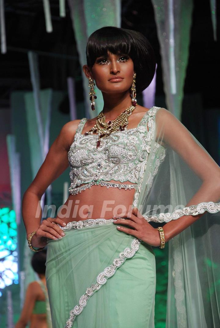 Model on the ramp at India International Jewellery Week on last day