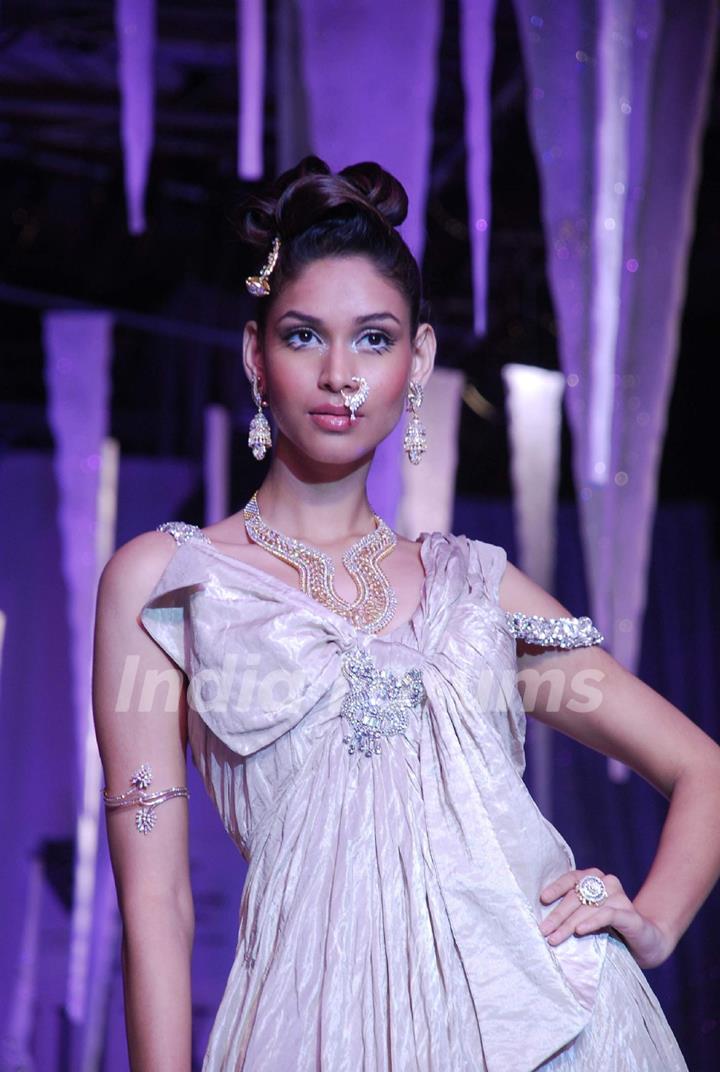 Model on the ramp at India International Jewellery Week on last day