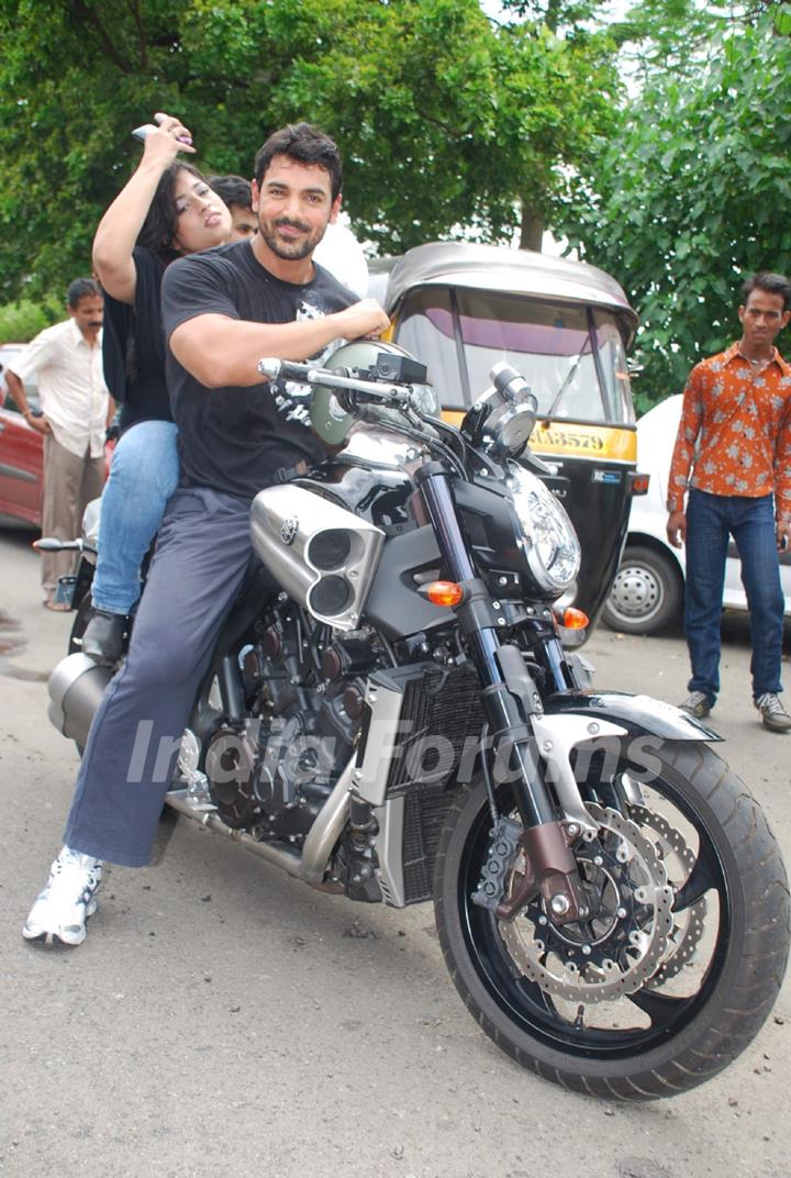 John takes a bike ride with RJ Malishka at Bandra