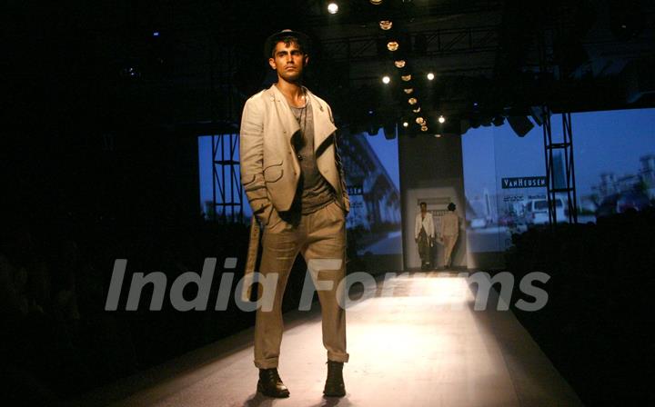 A model showcasing designers Rohit Gandhi and Rahul Khanna''s creation at the Ven Heusen India Mens Week, in New Delhi