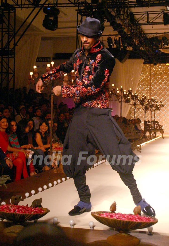 A model showcasing designer Rohit Bal''s creation at the Ven Heusen India Mens Week, in New Delhi