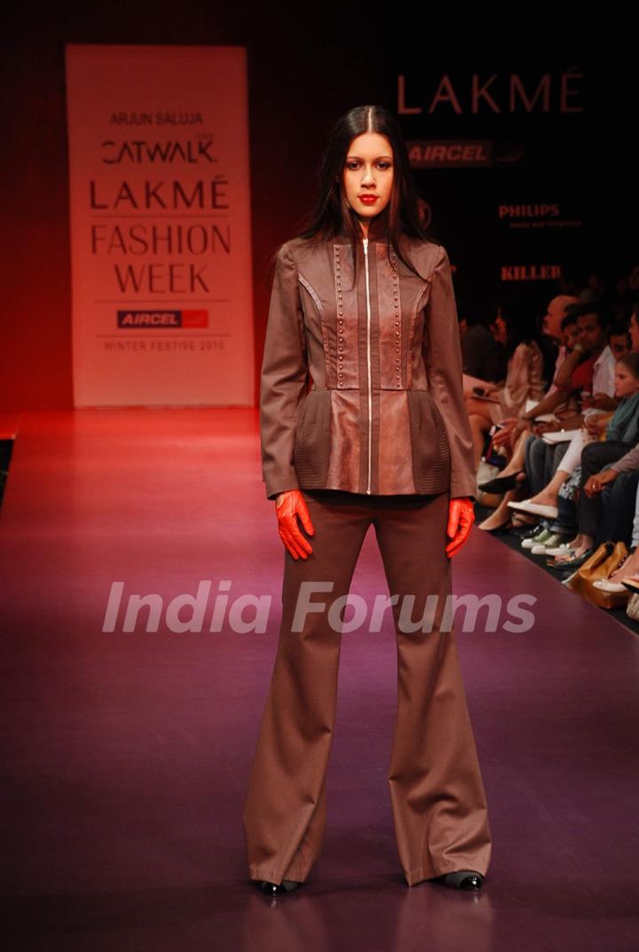 A model walks the runway in an Arjun Saluja design at the Lakme Fashion Week