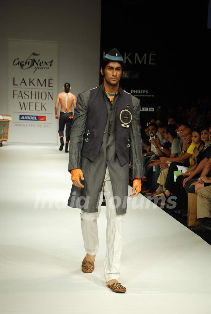 A model walks the runway in an Gen Next design at the Lakme Fashion Week