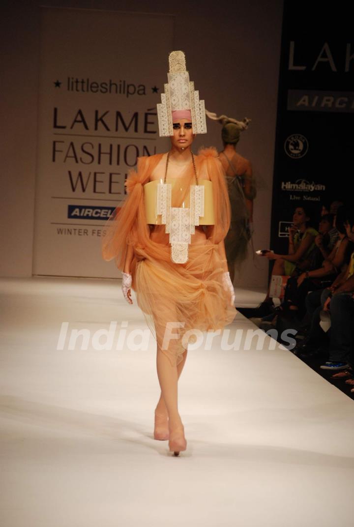 A model walks the runway in an Little Shilpa design at the Lakme Fashion Week