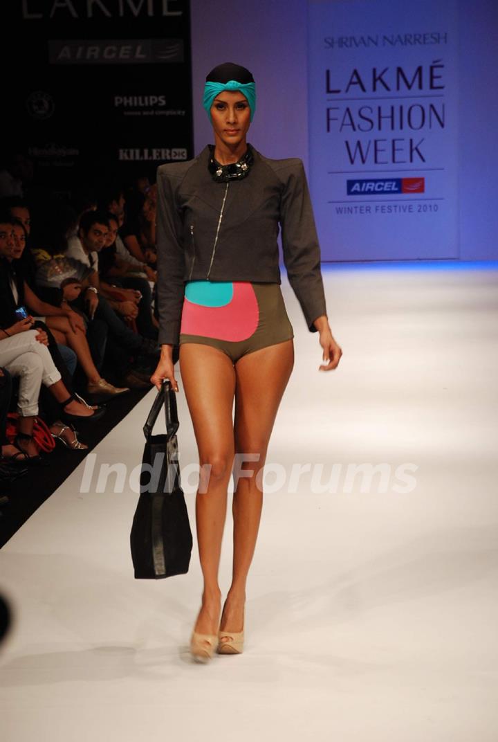 A model walks the runway in an Shrivan Narresh design at the Lakme Fashion Week