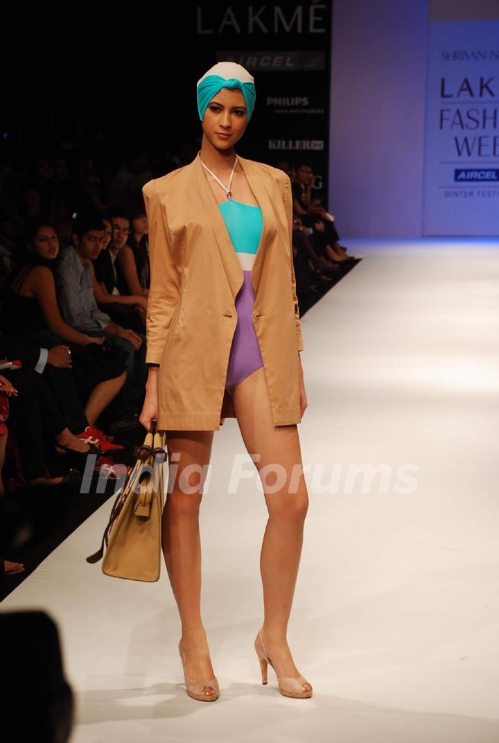 A model walks the runway in an Shrivan Narresh design at the Lakme Fashion Week