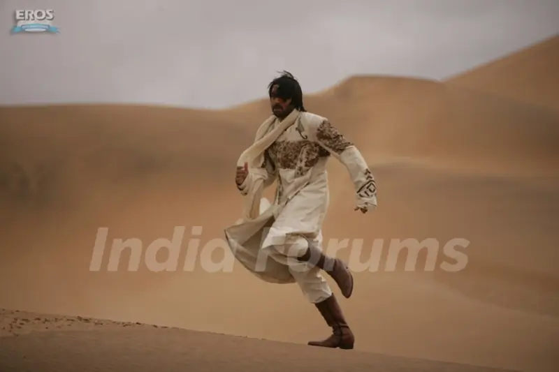 Abhishek running on the sand