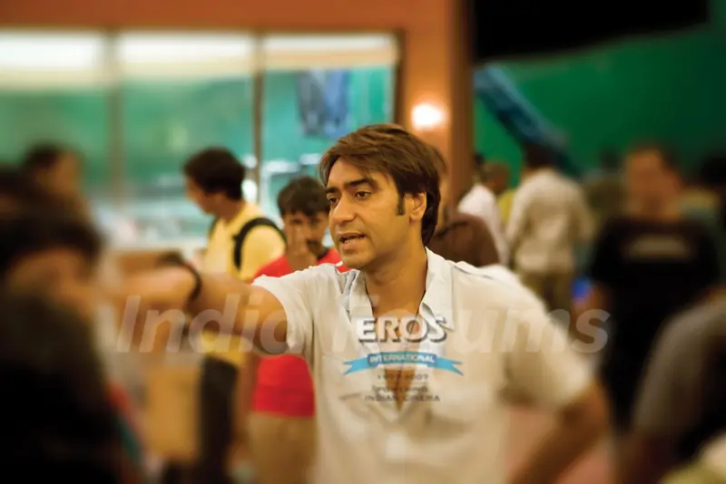 Ajay Devgan explaning someone